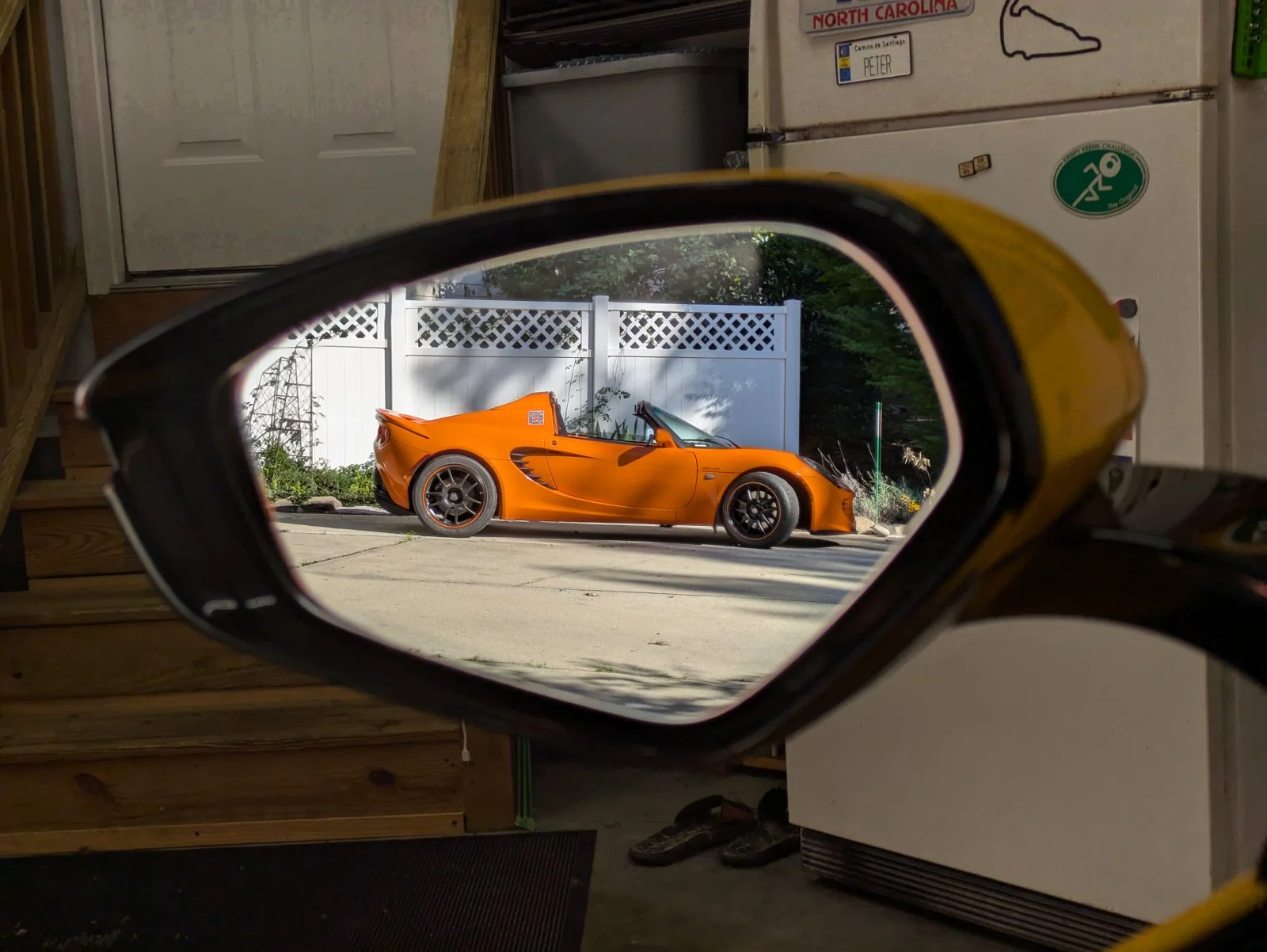 Elise in Emira side mirror.webp