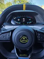 Yellow Steering Wheels with emblems.webp