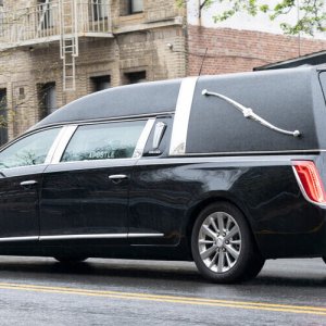 hearse-or-funeral-car-on-the-street-1000x500.jpg