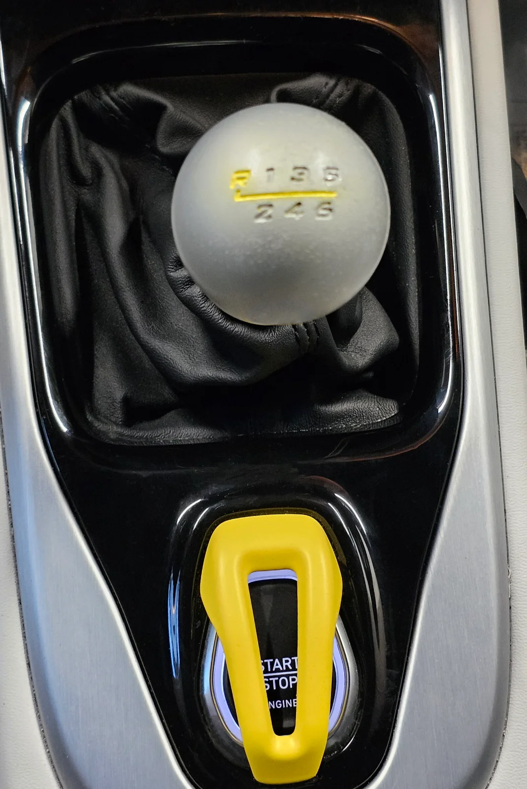 Emira Painted shift knob and starter switch.webp