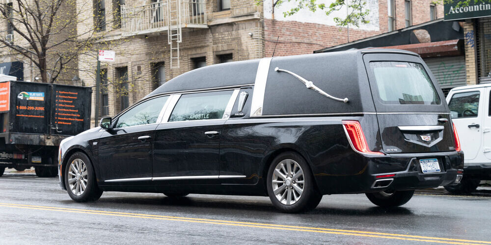 hearse-or-funeral-car-on-the-street-1000x500.jpg